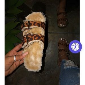 I am selling 2 furry “Birkenstock” style sandals.